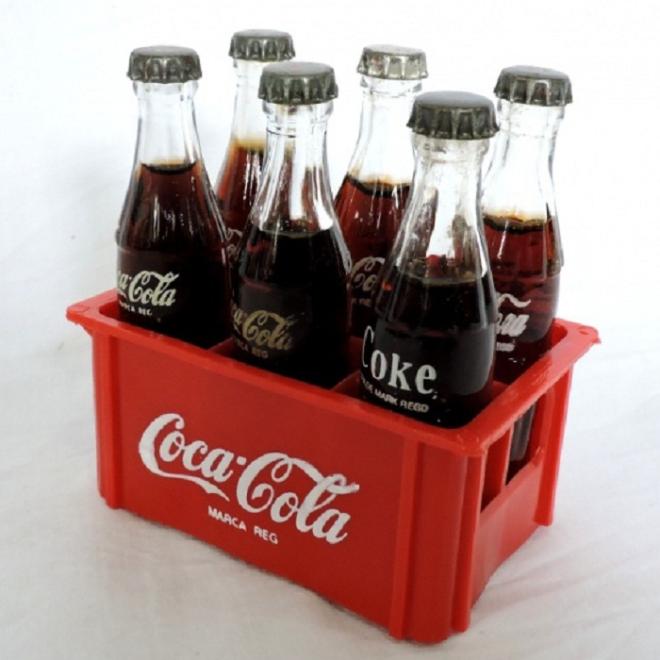Garrafas em miniatura da Coca-Cola