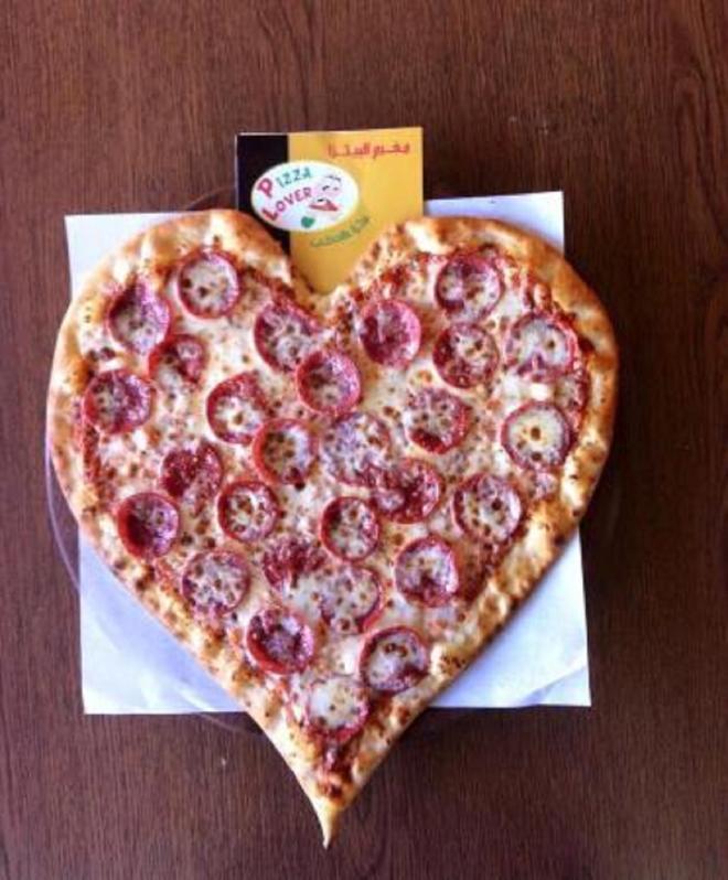 Pizza della casa del Favitta's Family (8.200 $)