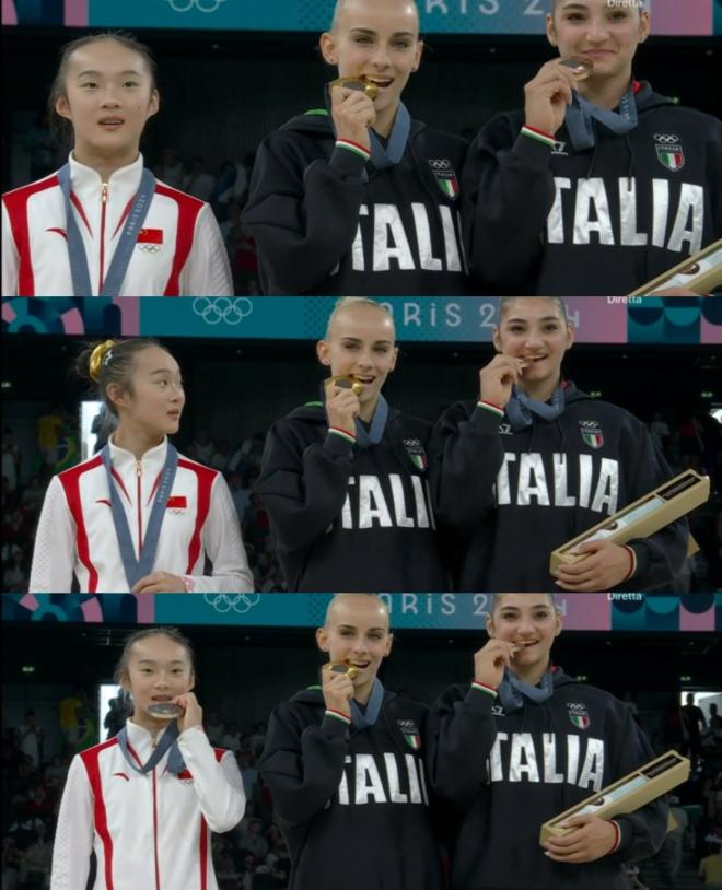 Zhou Yaqin emula le avversarie e morde la medaglia sul podio