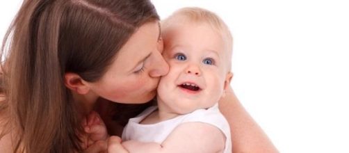 Mother and cute Baby cuddling