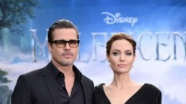 Pitt e Jolie alla presentazione di Maleficent.