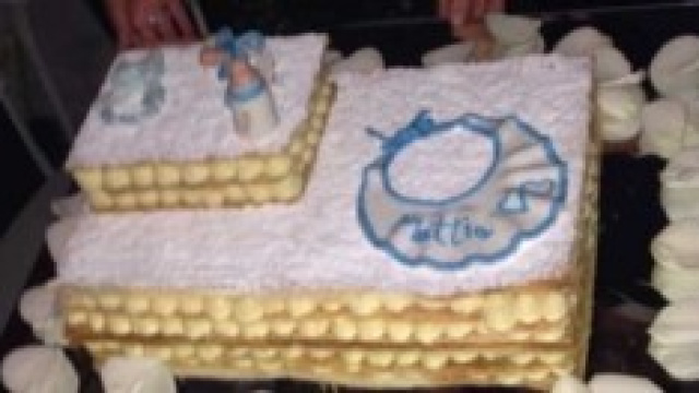 Manuela Arcuri al battesimo di Mattia