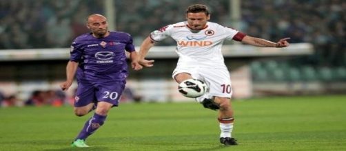 Borja Valero and Francesco Totti