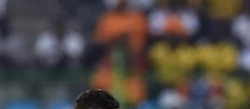 Moting takes on Guinea's defender Constant 