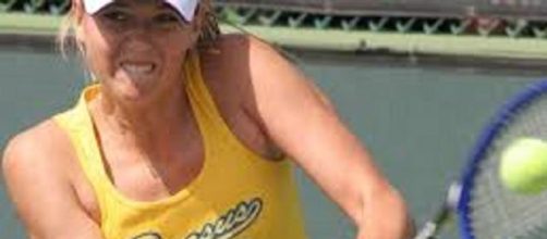 Sharapova brushed Bouchard aside in straight sets