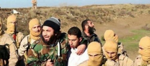 Jordanian Pilot, M. al-Kaseasbeh, being captured