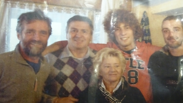 SIC SIMONCELLI ritratto in una foto appesa al muro