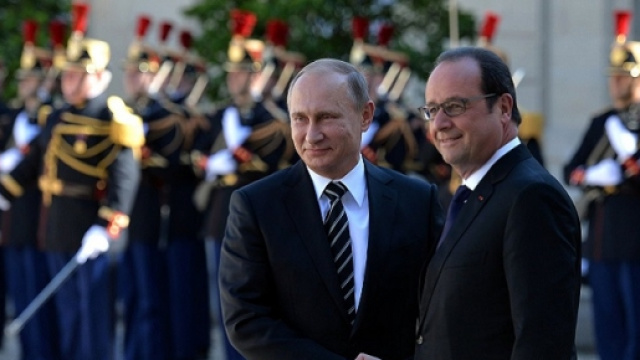 Vladimir Putin e Fran&ccedil;ois Hollande