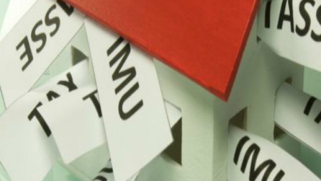 Immagine di una casa piena di tasse
