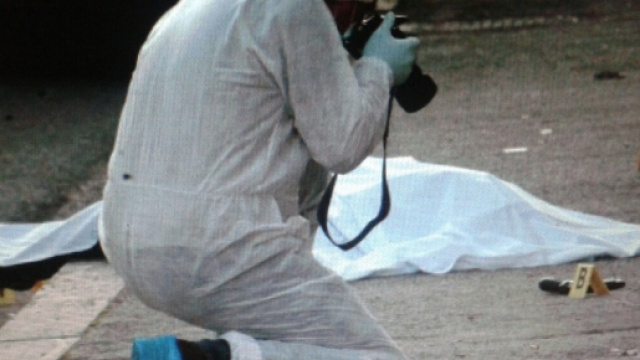Gli scatti fotografici sulla scena del delitto.