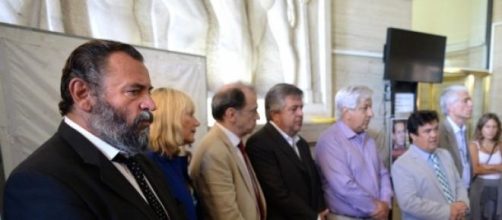 Piumato junto a los fiscales