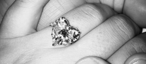 The heart-shaped ring matches the star