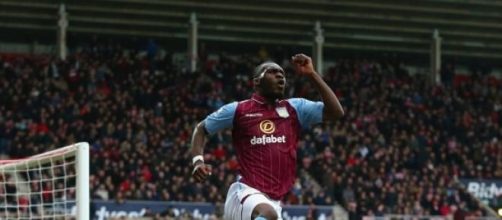 Benteke celebrates scoring Villa's fourth goal 