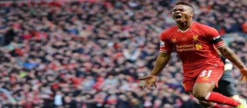 Raheem Sterling celebrates opening the scoring