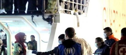 Capsized boat refugees arriving to Palermo, Italy.