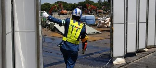 The Japanese National Stadium being dismantled