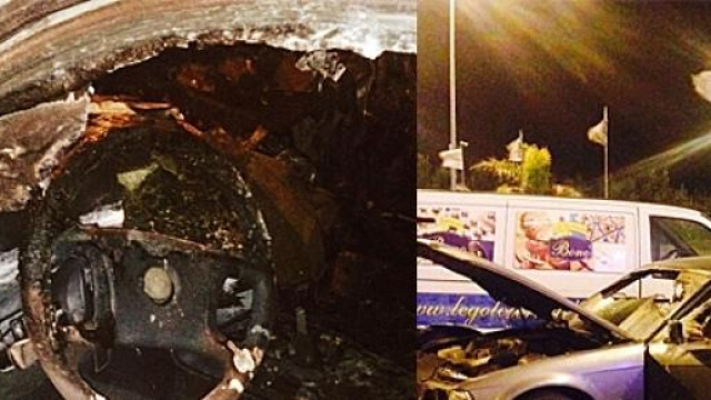 Auto e direttrice di banca in fiamme