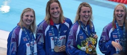 Becky Adlingon (left) during her swimming days 