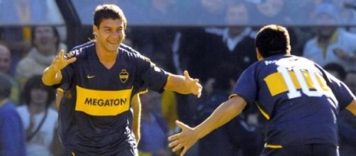 Seba y Rom&aacute;n festejando el gol frente a River