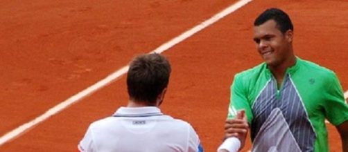 Wawrinka (left) ended Tsonga's hopes in Paris