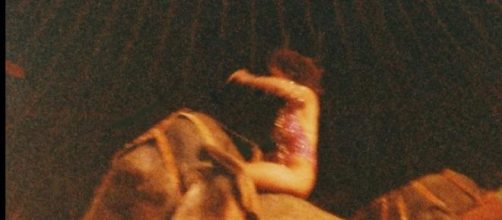 Kathleen Cremonesi riding a circus elephant.