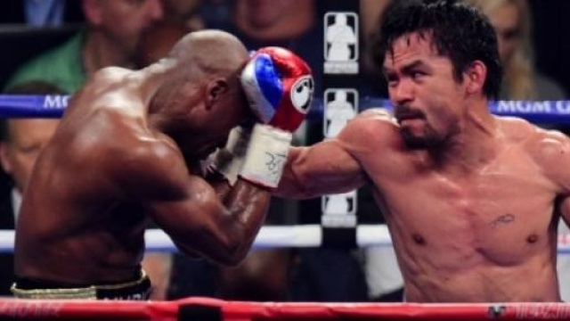 Boxe in tv, una scena di Mayweather vs Pacquiao