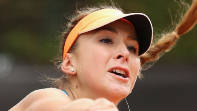 La tennista svizzera alla battuta