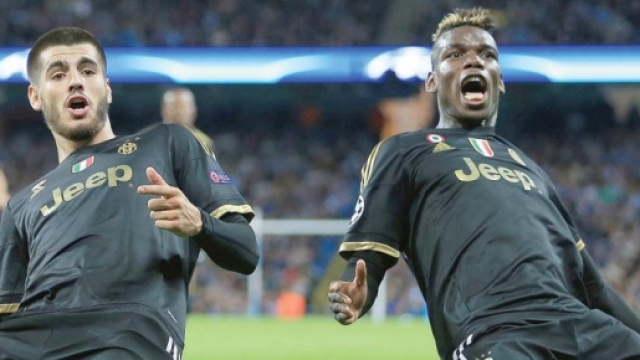 Morata e Pogba dopo il 2-1 contro il City