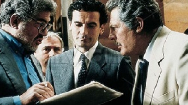 Ettore Scola con gli attori Troisi e Mastroianni