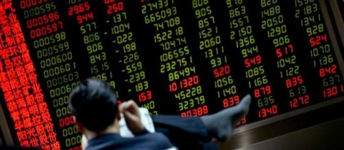 Investors wait patiently as global markets fall