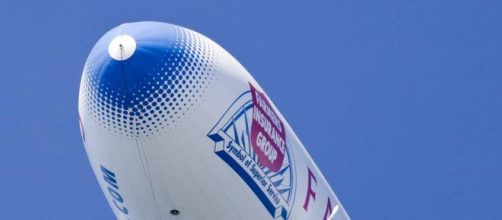 Blimp with Farmers Insurance logo (Wikipedia)
