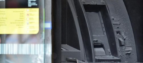 An ATM machine is burned at a branch of the Commonwealth bank
