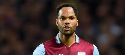 Former rangers target joleon lescott signs for aek athens ... - scoopnest.com