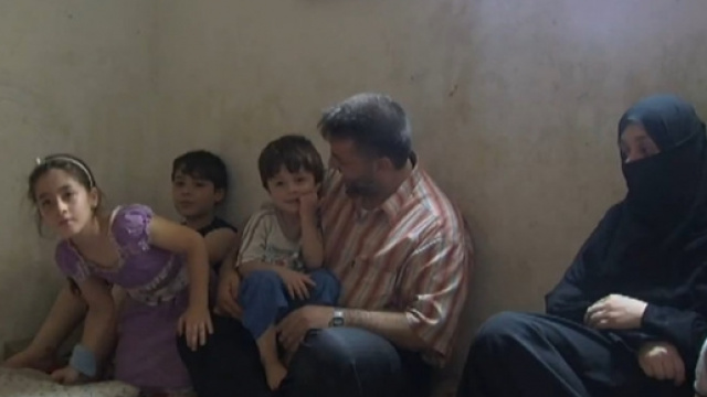 Una famiglia di profughi siriani