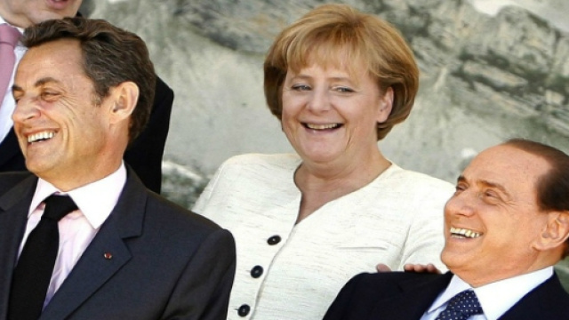 Fotografia con Sarkozy, Merkel e Berlusconi