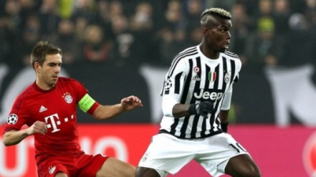 Pogba e Lahm, uno dei tanti duelli della partita