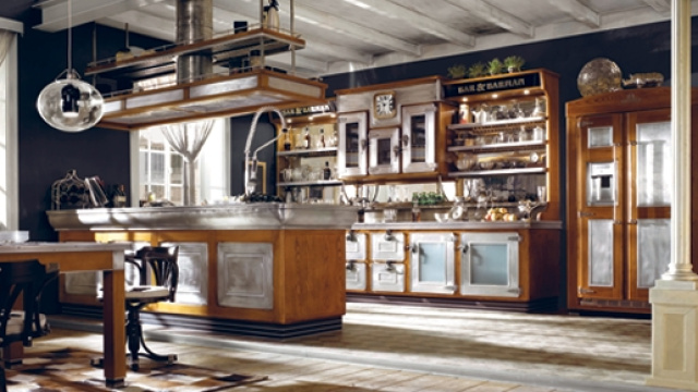 L&rsquo;uso di peltro e legno &egrave; la peculiarit&agrave; della cucina Bar & Barman di Marchi Cucine