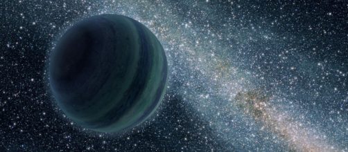 Interpretaci&oacute;n art&iacute;stica de un planeta n&oacute;mada dentro de la V&iacute;a L&aacute;ctea