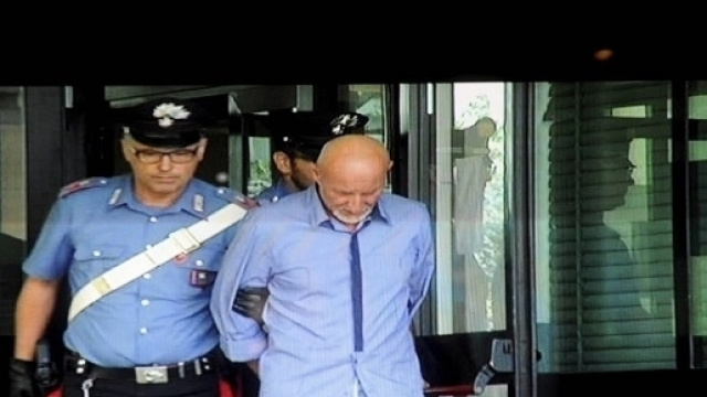 Roberto Garini al momento dell'arresto per l'omicidio della 44enne Emanuela Preceruti (foro: Repubblica.it)