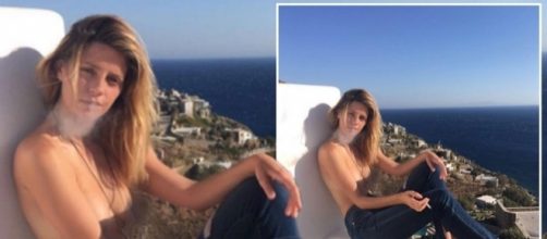 Mischa Barton shows off assets in topless snap