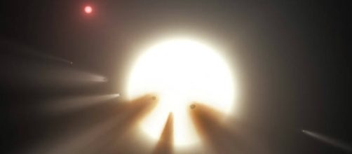 Illustration of star behind shattered comet | NASA/JPL-Caltech, nasa.gov (public domain)