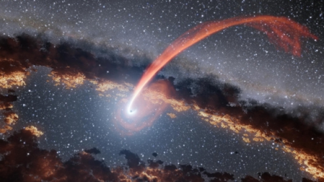 Illustrazione di un bagliore di luce proveniente dalla distruzione di una stella inghiottita da un buco nero. Foto credit: NASA/JPL-Caltech