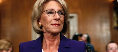 Betsy DeVos pick pushes vouchers, parries questions over ethics ... - cnn.com