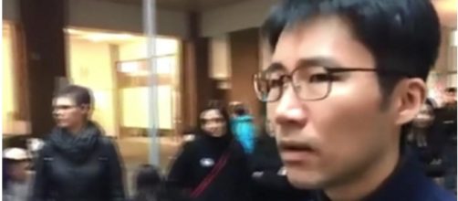 This is Library shouts Washington student silencing Anti-Trump protestors / photo by Alex Rozier via King 5 News Youtube