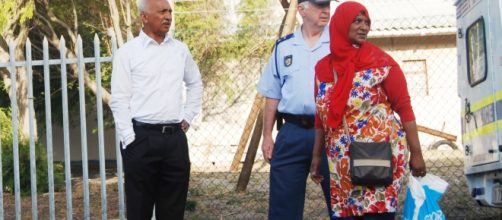 ON GANGSTER HIT LIST -- police chief Colonel Fanie Scanel with two community workers who are threatened with death by gabgsters