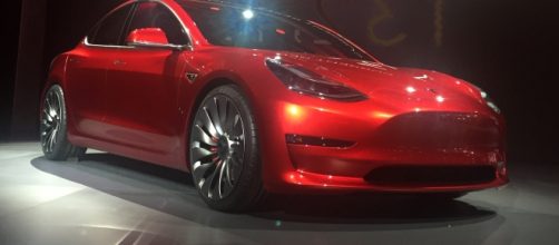 Red Tesla Model 3 at the March 31, 2016, unveiling event, Hawthorne, California by Steve Jurvetson/Wikimedia Commons
