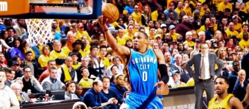 Russell Westbrook takes it to the hoop. [Image via: Erik Drost]