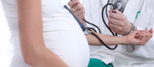 A pregnant woman during prenatal check-up. [image via Wikimedia Commons, Pilirodriguez]