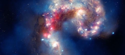 This composite image of the Antennae galaxies. [image via Wikimedia Commons, Smithsonian Institution from United States]