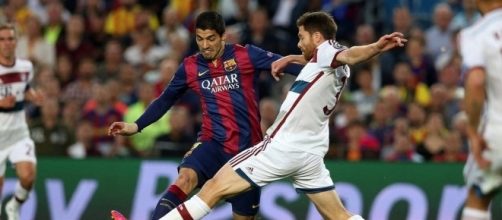 Barcelona striker Luis Suarez in action in a past match. [Image Credit: Guillermo Garay/Flickr]